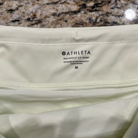 Athleta Run With it - 3.5
Size - Medium 
ONLY light green/ Lime green available - Picture 8 of 8